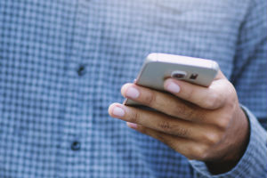 Man holding cell phone