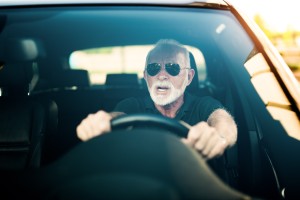 older driver behind wheel