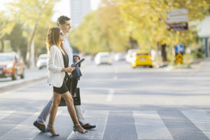 Pedestrian couple at crosswalk