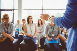 Teacher speaking to class