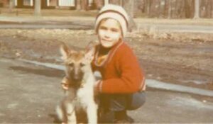 Young Richard Rizk with puppy